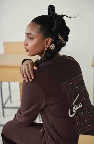 Manto's Unisex Premium Fleece Sanki Brown Sweatshirt featuring Motif with Urdu Calligraphy at the Back