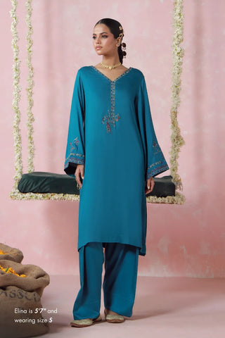 Blue Co-Ord Set, features herringbone short shirt and shalwar, embroidered with Mir Taqi Mir’s poetry.