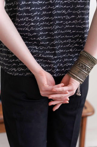 Shopmanto UK, manto UK, manto pakistani clothing brand, urdu calligraphy clothes, manto UK ready to wear one piece black short alfaaz (words) inner shirt for women, pakistani urdu sleeveless shirt