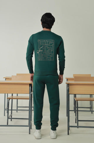 Manto's Unisex Premium Fleece Green Sanki Sweatshirt Featuring Urdu Sanki Motif at the back Paired with Pink Jogger Pants