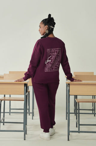 Manto's Unisex Premium Fleece Plum Sanki Sweatshirt featuring Urdu Sanki Motif at the Back Paired with Plum Jogger Pants