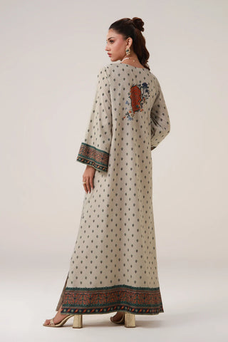 Printed kaftan with embellishments on the neckline, and the words of Jaleel Manikpuri calligraphed across.