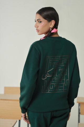 Manto's Unisex Premium Fleece Green Sanki Sweatshirt Featuring Urdu Sanki Motif at the back Paired with Pink Jogger Pants