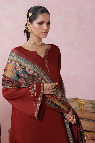 Red 2 piece herringbone set with a short shirt and shalwar, featuring urdu words.