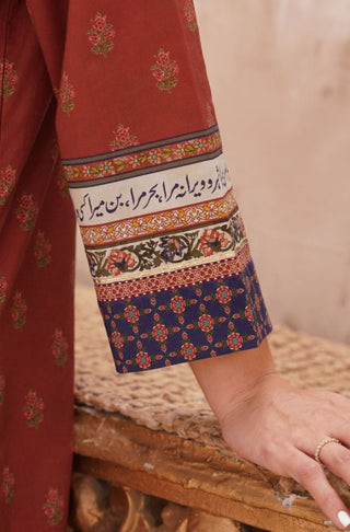 Sleeve Detail of Manto's Rust & Indigo Printed Fitrat Kurta with Urdu Calligraphy