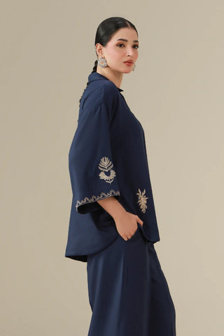 dobby crepe set featuring a short shirt, ijaar pants, and the words of Jaleel Manikpuri embroidered throughout.